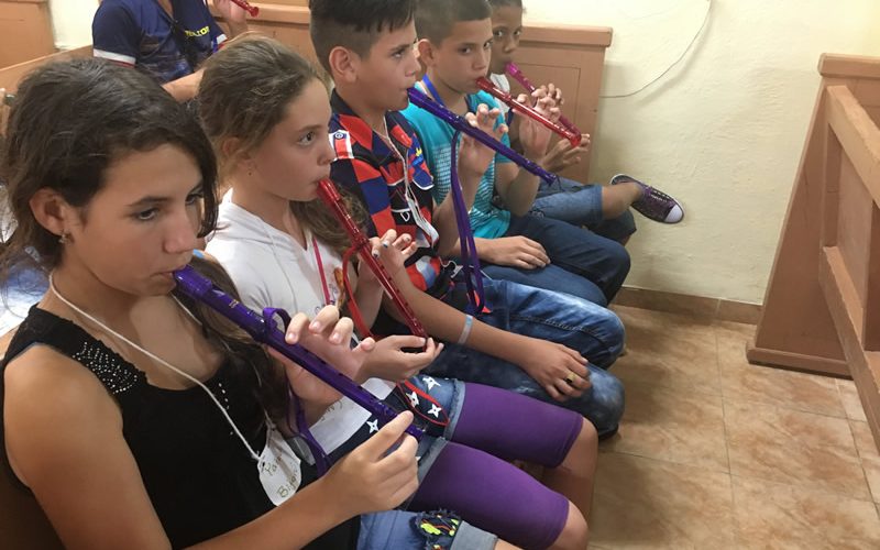 students playing recorder in school